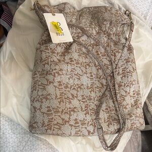 HOBO Tan and White Floral Drawstring Bag